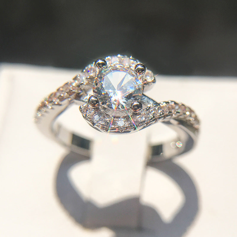 Elegant Zircon Twist Ring