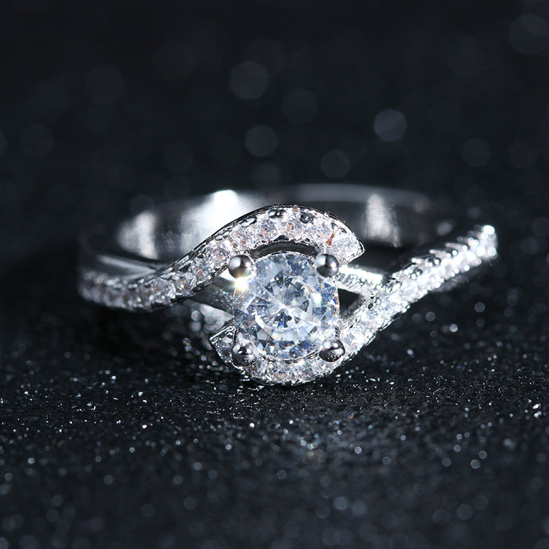 Elegant Zircon Twist Ring