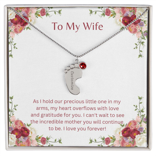 Celebrate your baby's birthdate with a stunning engraved baby feet with birthstone keepsake. Personalize this beautiful gift to cherish forever. Order now!