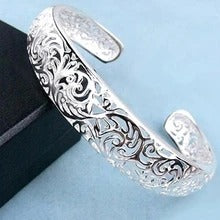 Swirling Hollow Bangle Bracelet