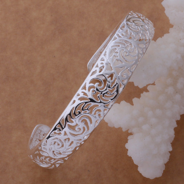 Swirling Hollow Bangle Bracelet