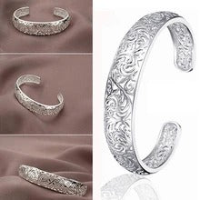 Swirling Hollow Bangle Bracelet