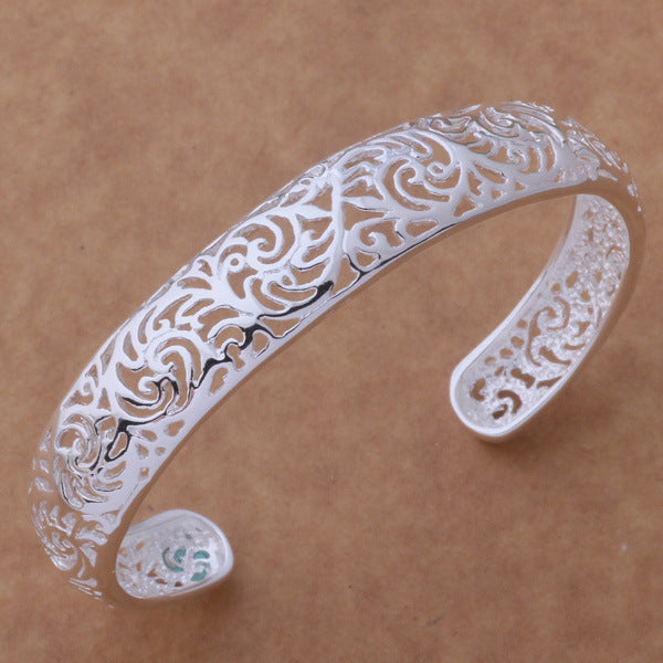 Swirling Hollow Bangle Bracelet