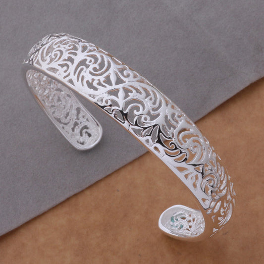 Swirling Hollow Bangle Bracelet