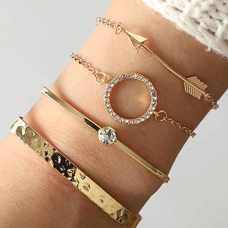 Elevate your accessory game with our 4-piece rhinestone bracelet set. The perfect combination of sparkle and style, these bracelets are the ultimate fashion statement for any occasion.