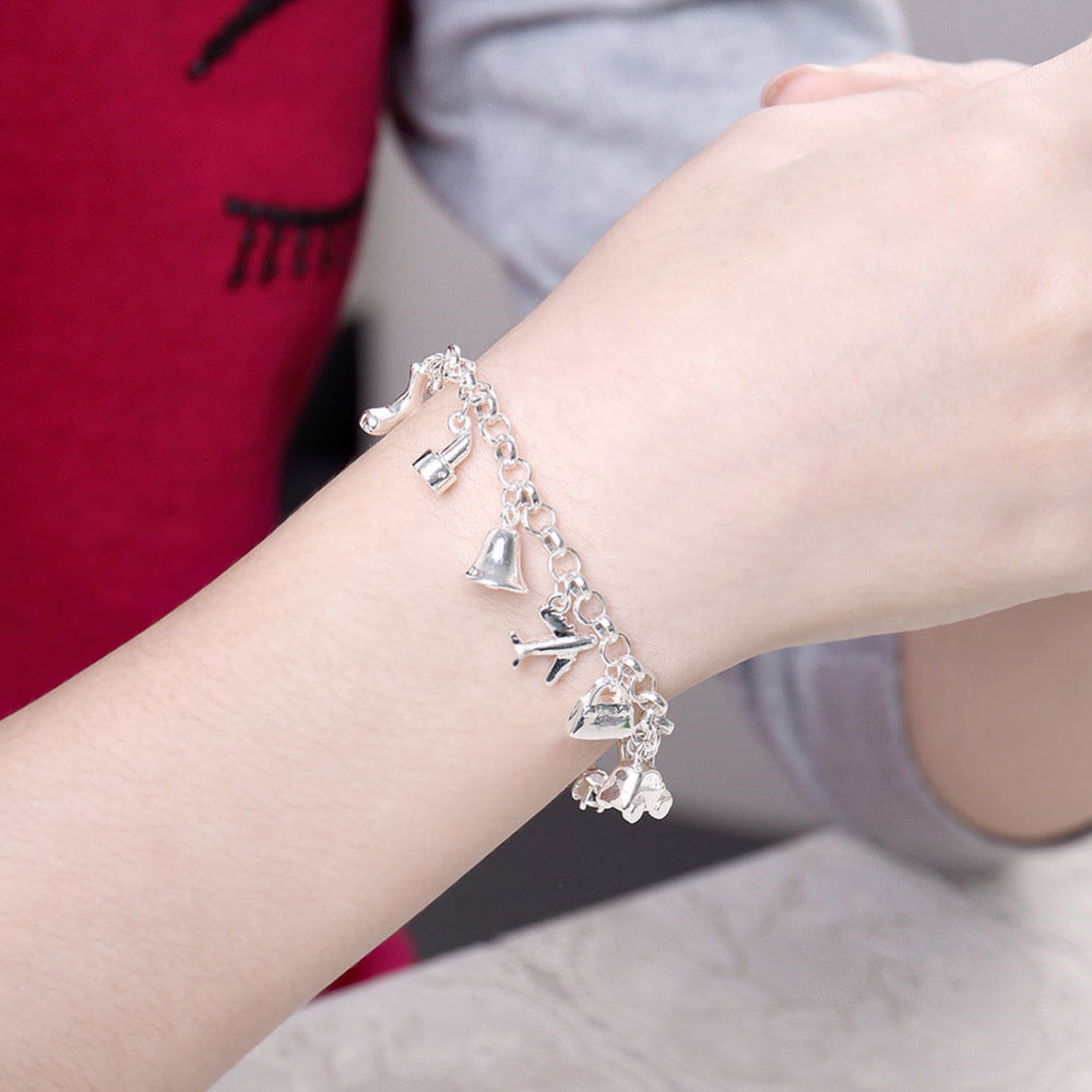 Silver Bracelet with Assorted Charms