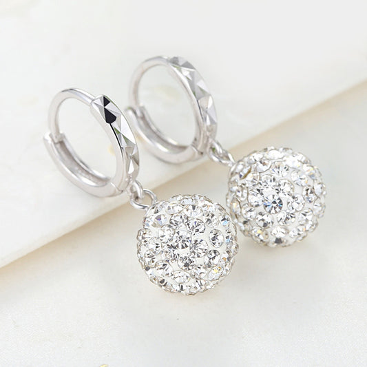 Upgrade your jewelry collection with our sterling silver rhinestone earrings. These versatile accessories add a touch of sparkle to any outfit, perfect for any occasion. Shop now and add some glamour to your look!