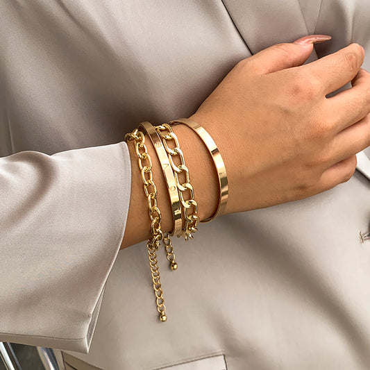 Looking for a modern and chic accessory to elevate your look? Our sleek C-shaped bracelet set is perfect! Shop now for a stylish addition to your wardrobe.